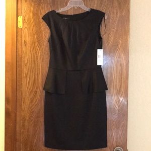 Black peplum dress. Sz 8.  New with tags